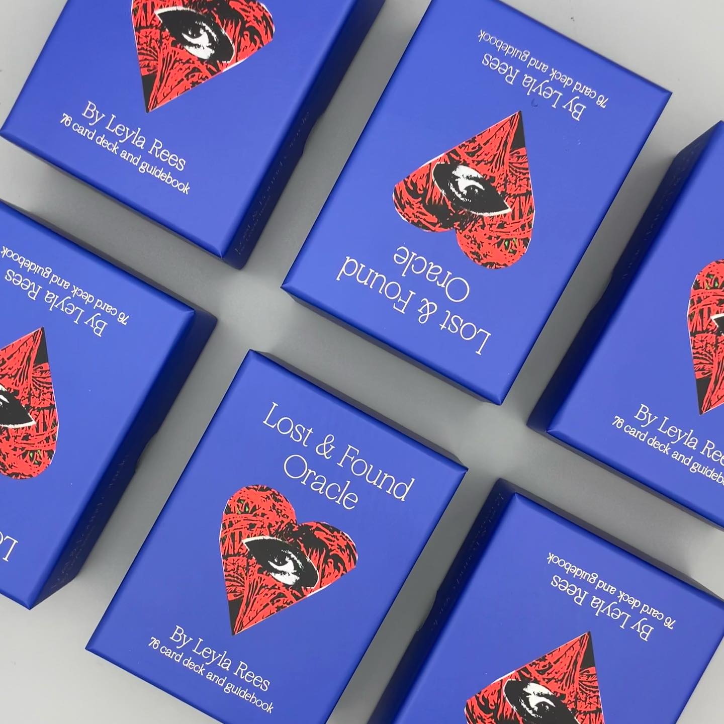 Premium product packaging with bold blue design, luxury bespoke packaging print London