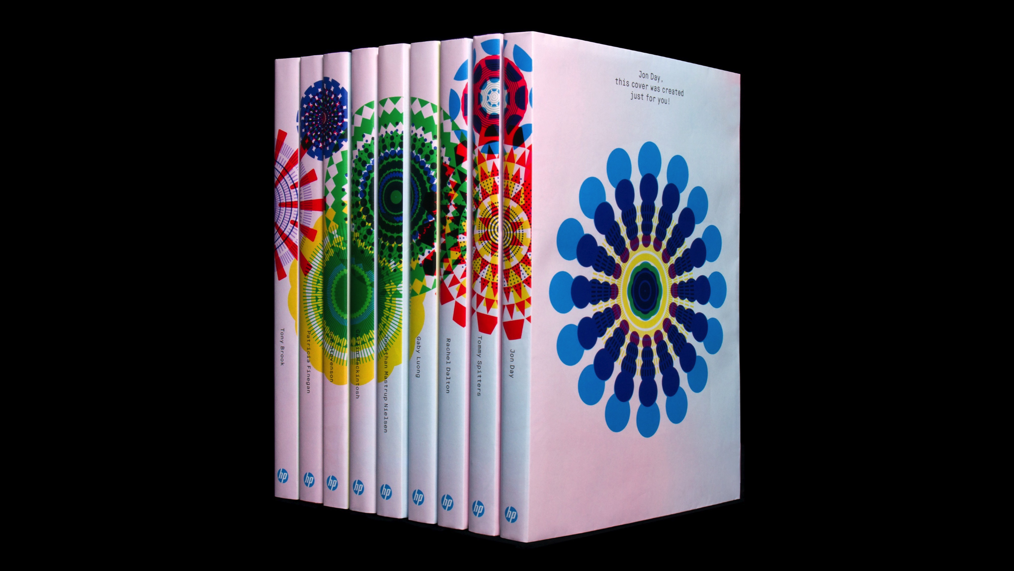 Printed book with custom colourful covers forming a continuous spine design