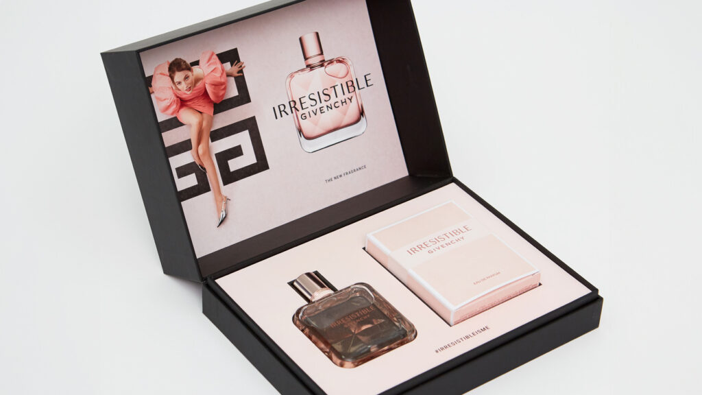 Bespoke luxury product packaging with printed inserts holding Givency products, Premium packaging and design print London