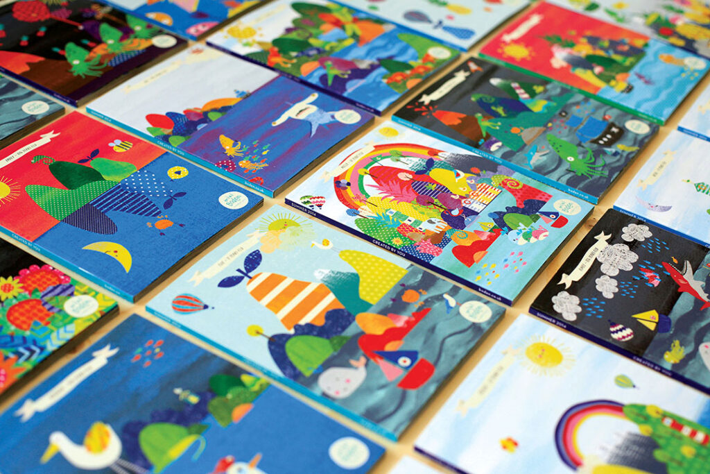 Collection of colourful illustrated books displayed together, showcasing vibrant cover printing and high-quality colour reproduction