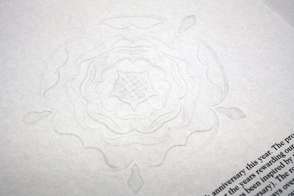 Luxury blind debossed paper stock detail